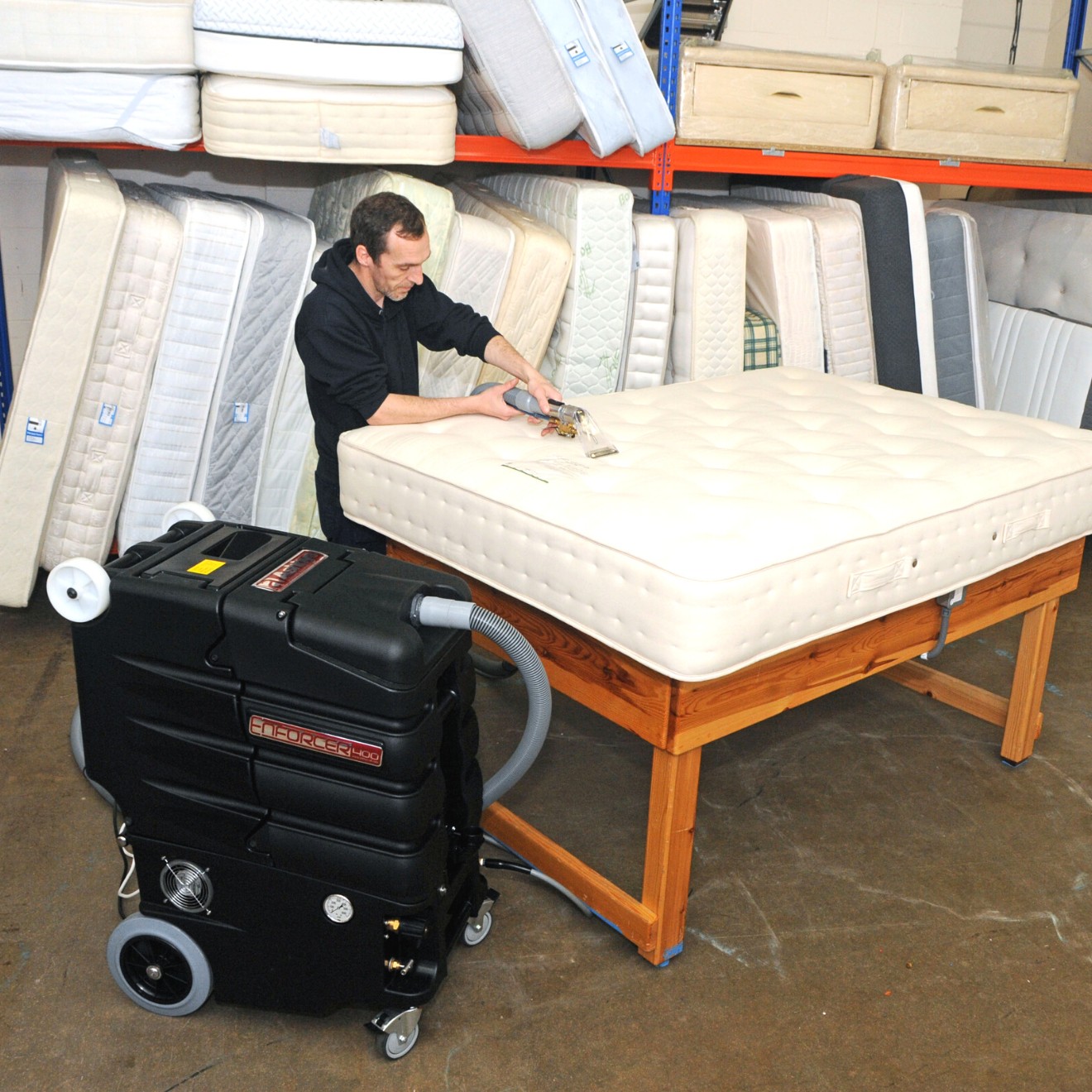 Reusable mattress being professionally cleaned