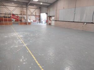 Old warehouse floor with asbestos